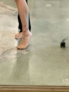 a person standing on top of a wet floor