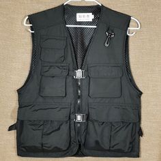 This item is for one waistcoat only. Unisex Casual Cargo Waistcoat Gilet Multi Pocket Sleeveless Jacket Vest Outdoor Please be reminded that due to lighting effects and monitor brightness/contrast setting, the color tone of the website photo and the actual item could be slightly different. This is in Asian sizing, smaller than western size e.g. UK, US, AU. Please check the measurements carefully before making a purchase. Beside, Please allow 1-3 cm difference due to manual measurement. If you ar Pocket Vest, Cargo Vest, Fishing Vest, Types Of Jackets, Jacket Vest, Sleeveless Jacket, Photography Travel, Color Tone, African Clothing