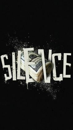 a stack of money sitting on top of the word slicence written in white paint