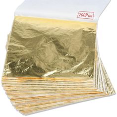 gold foil bags are stacked on top of each other