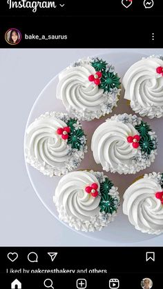 four decorated cupcakes sitting on top of a white plate with red and green decorations