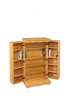 a wooden bookcase with two doors open