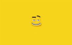 a yellow background with an emoticive smiley face on the bottom right corner and one eye open