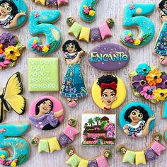 decorated cookies are arranged in the shape of numbers for children's birthdays and special occasiones