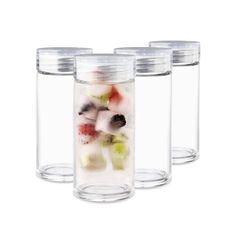 three clear jars filled with different types of fruit