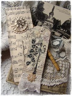 an assortment of paper and doily on lace