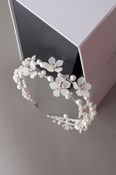 Bridal headband floral, White flower headband, Wedding headband for bride, Bride headband, Bridal headpiece floral, Flower headpiece, Floral bridal tiara This exquisite wedding blossom double headband is a perfect choice for a modern bride! It looks great even if you are keeping long curls or straight hair.  The accessory is attached to a silver headband for a secure fit. The flowers are made of UV resin, that is the new trend in handmade jewelry. Each petal is created manually.  - Flexible, eas Wedding Blossom, Headband For Bride, White Flower Headband, Beautiful Headbands, Double Headband, Flower Headband Wedding, Wedding Accessories For Bride, Flower Headpiece Wedding, Flower Hair Accessories Wedding