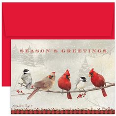 a christmas card with three birds sitting on a branch and the words season's greetings