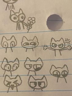 several drawings of cats and birds on lined paper