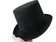 PRICES MAY VARY. Polyester Imported Pull On closure Hand Wash Only Victorian black top hat. This Victorian top hat features high-quality felt and a black ribbon Hatband with a bow on the side for a sophisticated look. This Victorian hat is made with 100% polyester material. Measuring 10 3/4in wide x 11 3/4in long x 7in tall, this black top hat will last you party after party. This costume hat is a perfect accessory to complete your party costume. Wear it to your Halloween party, themed parties, Tiny Top Hat, Victorian Top, Hat Cosplay, Rock Hat, Victorian Hats, Black Top Hat, Steampunk Cosplay, Dressup Party, Victorian Steampunk