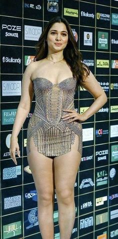 an image of a woman that is posing for the camera in a corset