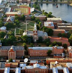 an aerial view of the campus and surrounding buildings