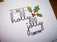 a christmas card with holly on it and the words have a holly jolly christmas written in black ink