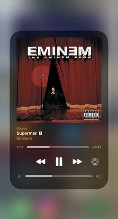 an mp3 player with the message eminem on it's screen and music play button highlighted