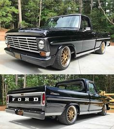 an old black truck with gold rims parked in front of some trees