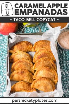 an image of caramel apple empanadas in a box on a table