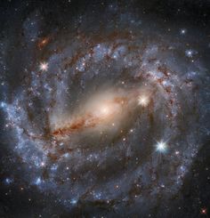 an image of a spiral galaxy in the sky