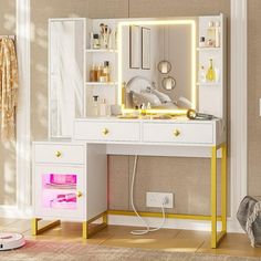 a white vanity table with a mirror and lights on it in a room next to a wall