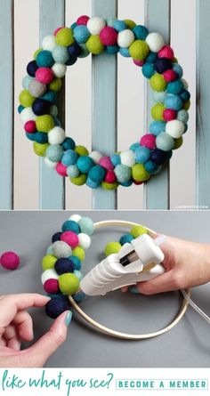 a wreath made out of felt balls and yarn is being used to make a pom - pom wreath