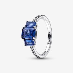 Elevate any look with the Blue Rectangular Three Stone Sparkling Ring. Crafted from sterling silver, this hand-finished ring is set with three rectangular radiant-cut princess blue man-made crystals. A row of clear cubic zirconia pavé runs along the band to give the ring a delicate, sophisticated look. Wear yours solo or stack it with other styles to make an elegant statement. Color: Blue. Metal: Sterling silver. Material: No other material. Stone: Mixed stone. Size: 48 Pandora Blue, Blue Stone Ring, Pandora Rings, Rings Jewelry Fashion, Sparkling Rings, Radiant Cut, Thomas Sabo, Three Stone Rings, Engagement Jewelry