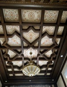 the ceiling is decorated with intricate designs