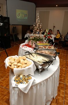 a buffet table filled with lots of food