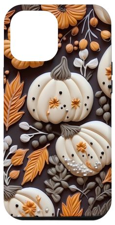 an image of pumpkins and leaves on a phone case