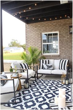 a black and white rug on a porch