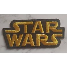 the star wars logo is shown on a marble surface