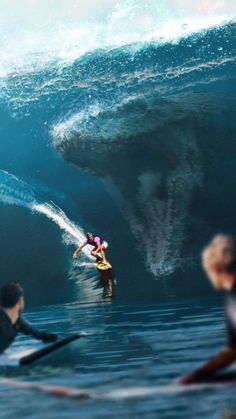 people are watching a surfer ride a large wave