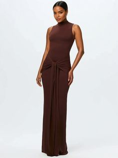 Discover this chic brown sleeveless maxi dress with a high neck and waist-knot detail. Perfect for formal events or a night out, offering elegance and comfort in a stylish silhouette. Shop now! Brown Elegant Dress, Brown Formal Dress, Brown Dresses Formal, Long Sleeve Activewear, High Neck Maxi Dress, Maxi Bodycon Dress, Bodycon Maxi Dress, Elegant Maxi Dress, Bodycon Maxi Dresses