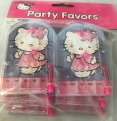 two hello kitty party favors in plastic packaging