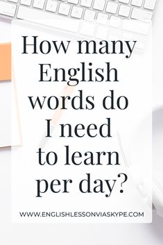 the words how many english words do i need to learn per day? on top of a desk