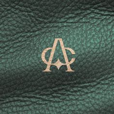 green leather texture with the letter a on it