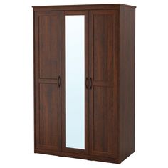 a wooden armoire with mirrored doors on the front and side panels in dark wood