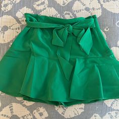 Nwt, Never Worn, Built In Shorts Chic Mini Skort With Tie Waist, Spring Flowy Skirt With Short Inseam, Chic Green Tie-waist Bottoms, Chic Green Bottoms With Tie Waist, Casual High Waist Skirt With Tie, Casual High-waisted Skirt With Tie Waist, Green Flowy Skirt For Spring, Casual High Waist Skirt With Tie Waist, Spring Night Out Belted Skirt