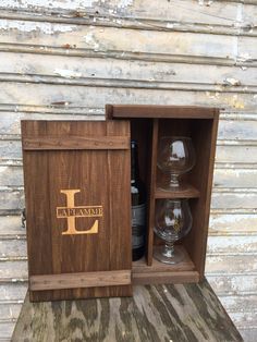 "Personalized Wooden Wine or Whiskey Gift Box. It fits a bottle of wine, whiskey or decanter and two glasses. Please refer to the dimensions to insure your items will fit. INTERNAL DIMENSIONS: -7 1/2\" wide x 13\" long x 4\" depth. -Bottle side is approximately: 3.5\" wide x 12.85\" height -Glass side is approximately: 3.5\" wide x 6.25 height (each glass spot) MANUFACTURING TIME IS 2-4 DAYS for this style. Aged Finishes do take the longest but look great RUSH 1 and 2 Day Manufacturing Items: ht Whiskey Gift Box, Personalized Wine Box, Wood Wine Box, Celebration Box, Wooden Wine Boxes, Package Ideas, Wine Gift Baskets, Wine Gift Boxes, Whiskey Gifts