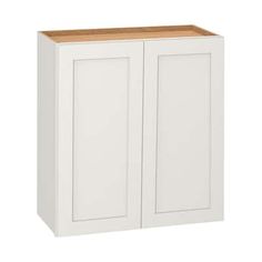 a white cabinet with two doors and a wooden shelf on the bottom, against a white background