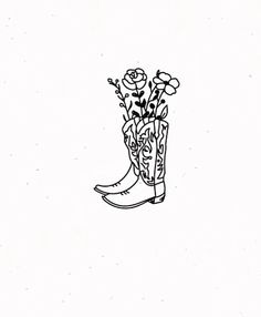 a drawing of a boot with flowers in it