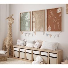 a room with some stuffed animals on the wall and pictures hanging above it, along with storage bins