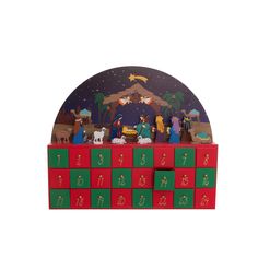 the nativity scene is made out of wooden blocks and painted with red and green squares