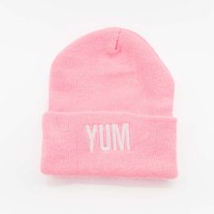 Yum is our mantra here at Cupquake HQ! Show your love for all things tasty with our Yum Beanie 100% Acrylic Yarn Pro-Rib Tompkin knit with solid cuff One size fits most Wash instructions: Wash cold with like colors. Do not bleach. Air dry. Do not iron. No softeners Orders processed within 2-3 business days. Trendy Letter Print Beanie For Winter, Trendy Winter Beanie With Letter Print, Cute Fitted Beanie For Winter, Trendy Pink Cotton Beanie, Cute Fitted Winter Beanie, Casual Beanie With Letter Print, Trendy Pink Fall Beanie, Casual Pink Beanie One Size, Casual Pink Beanie