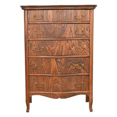 an old wooden dresser with brass handles and knobs on the top drawer, isolated against a white background