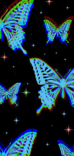 four glowing butterflies flying through the night sky