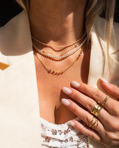 This timeless tennis necklace was designed to fit seamlessly into your everyday stack- the petite stones shine in the light while the design remains subtle enough for everyday wear. Crafted with high-quality pavé stones that glimmer like real diamonds, this piece looks just like its expensive diamond counterpart. 14k Gold Plated with pavé stones Length: 14.25" + 2" Ext Please remove this piece prior to any water or sweat exposure, as the integrity and shine of the stones may be compromised by wa Tennis Necklace Stack, Tennis Necklace Layered, Feels Heavy, Expensive Diamond, Necklace Stack, Diamond Tennis Necklace, Mexican Jewelry, Earrings Design, Popular Fashion