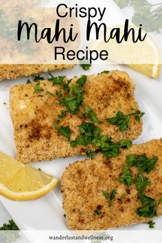 crispy mahi mahi recipe on a plate with lemon wedges and parsley