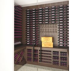 the wine cellar is filled with many bottles