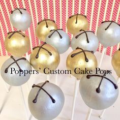 cake pops with gold and silver decorations on them