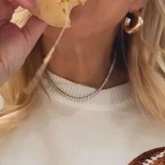 a close up of a person eating food