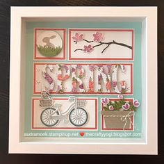 a shadow box with some flowers and pictures in it that spell out the word spring